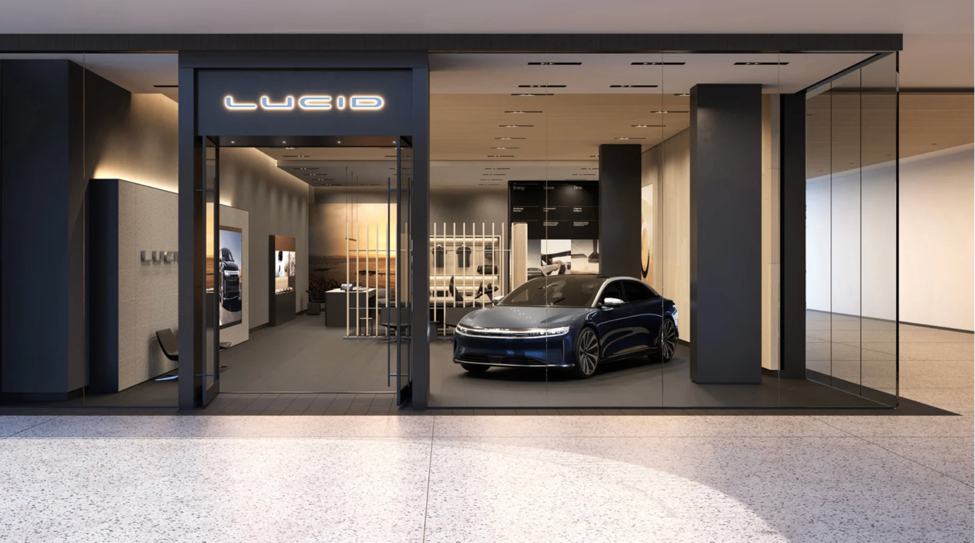 Lucid Motors design studio storefront with the brand's signature illuminated wordmark